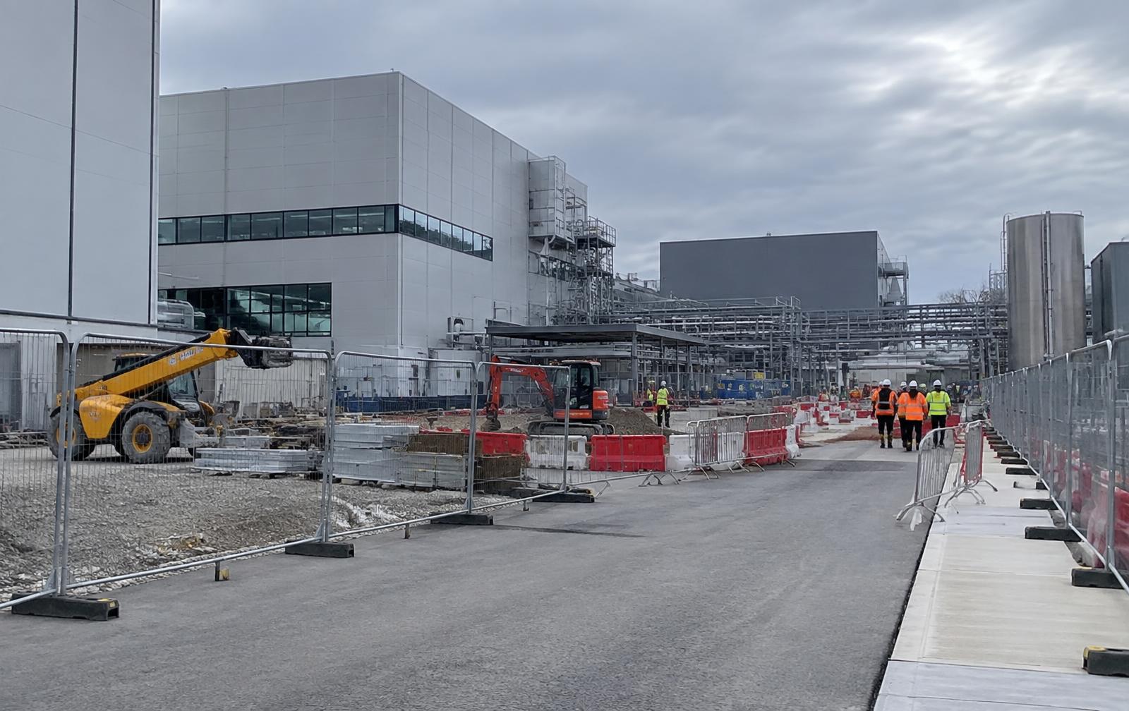 Pedestrian walkways and site logistics on a large industrial campus (illustrative)